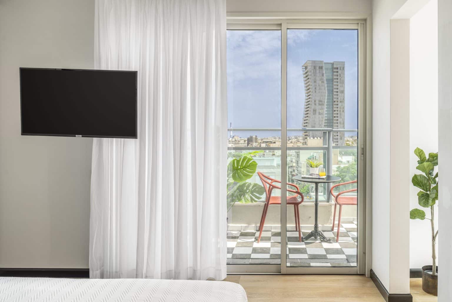 Balcony of a furnished apartment in the Old North of Tel Aviv